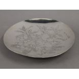 A Japanese silver dish. 24.5 cm diameter. 12.1 troy ounces.