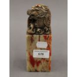 A Chinese soapstone seal. 16.5 cm high.