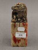 A Chinese soapstone seal. 16.5 cm high.