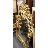 A large modern gilt framed mirror. 144 cm high.