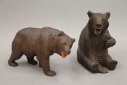 Two carved Black Forest bears. The largest 14.5 cm high.