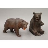 Two carved Black Forest bears. The largest 14.5 cm high.