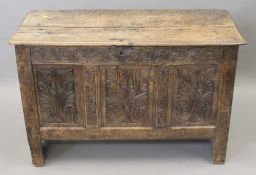 A 17th/18th century oak coffer. 105 cm wide.