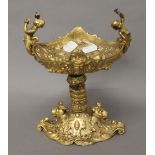 A gilt bronze tazza. 23 cm high.