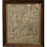 An 18th century needlework map of England and Wales, dated 1785, framed and glazed. 51.5 x 59.5 cm.