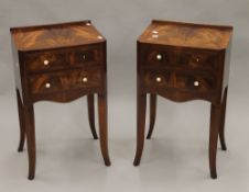 A pair of mahogany bedside drawers. 67 cm high.