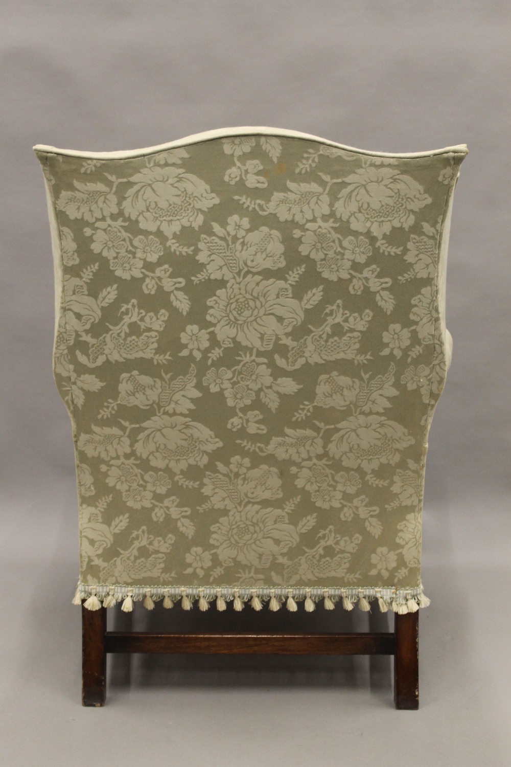 An early 20th century upholstered wing back armchair. 80 cm wide. - Image 4 of 8