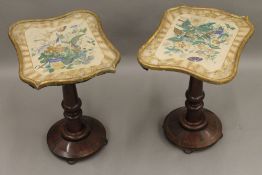 A pair of Victorian mahogany side tables with gilt framed painted tops. Each 60.5 cm high.