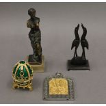 A small quantity of miscellaneous items, including a brass figure, an icon, etc.