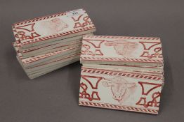 A set of twenty Belgian porcelain butcher shop tiles. Each 15 x 7.5 cm.