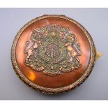 A Victorian copper seal box enclosing a wax seal (AF) and with velum indenture. 18 cm diameter.