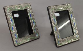 A pair of Art Nouveau style silver photograph frames. 14.5 x 19 cm.