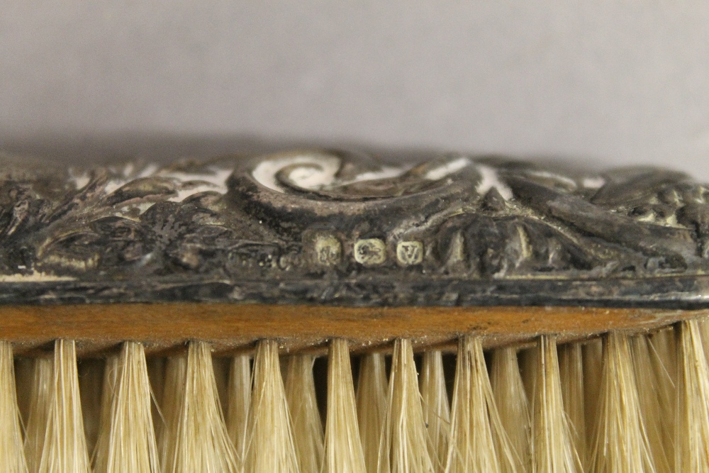 A quantity of silver backed dressing table brushes and mirrors. 52.8 troy ounces total weight. - Image 3 of 6