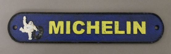 A cast iron 'Michelin' sign. 27 cm wide.