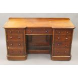 A Victorian mahogany dressing table. 138 cm wide.