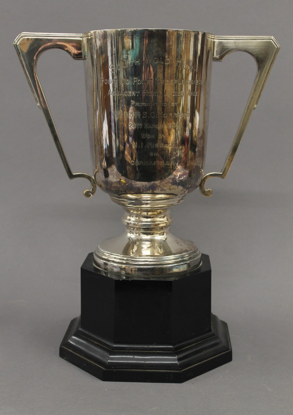 An engraved silver trophy cup on stand. 33.5 cm high overall. 30.2 troy ounces total weight. - Image 2 of 4