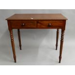 A Victorian mahogany two drawer side table. 86 cm wide, 47.5 cm deep, 76.5 cm high.
