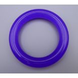 A lavender jade bangle. 8.5 cm diameter. (90.