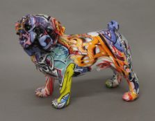 A graffiti decorated model of a pug dog.