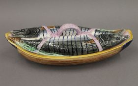 A late 19th century English Majolica 'mackerel lidded' boat shaped pate dish,