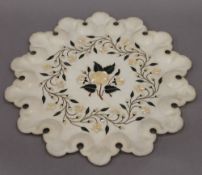 An Agra specimen inlaid marble tray. 35 cm diameter.