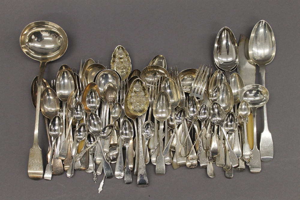 A large quantity of silver flatware. 148 troy ounces.