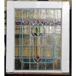 An early 20th century leaded stained glass window. 85 x 92 cm.