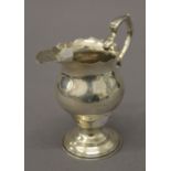 A silver cream jug. 11 cm high. 110 grammes.