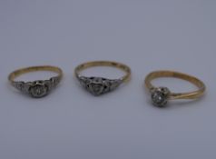 Three 18 ct gold and platinum diamond rings. 5.4 grammes total weight. Ring sizes: I/J, G/H and N.