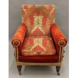 A Victorian tapestry upholstered covered armchair. 81 cm wide.