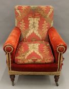 A Victorian tapestry upholstered covered armchair. 81 cm wide.