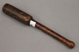 A Victorian treen fishing priest. 29.5 cm long.