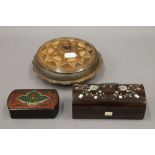 A mother-of-pearl inlaid rosewood box and two others. The former 14 cm wide.