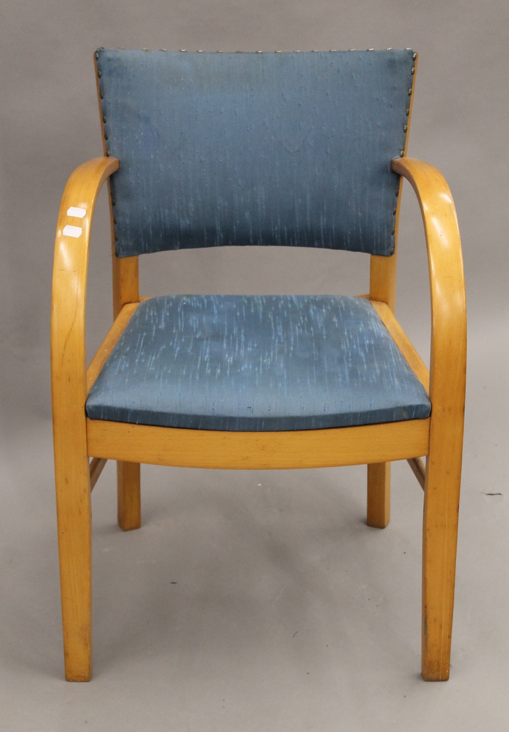 An Art Deco open armchair. 55 cm wide.