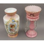 A Victorian pink glass lustre and a decorative glass vase. The former 35 cm high.