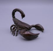 A bronze model of a scorpion. 5 cm long.