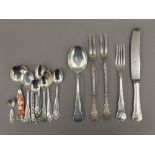 A small collection of Norwegian silver cutlery , including an enamel spoon. 6.8 troy ounces.