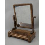 A Victorian mahogany toilet mirror. 50 cm wide.