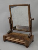 A Victorian mahogany toilet mirror. 50 cm wide.