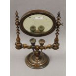 A Victorian turned wooden shaving mirror. 40 cm high.