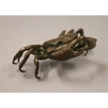 A bronze model of a crab. 11 cm wide.