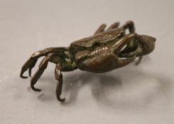 A bronze model of a crab. 11 cm wide.