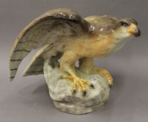 A Goldscheider Wien porcelain figure of a falcon. 32 cm high.