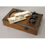 A Victorian Graphoscope stereoscopic viewer with cards. 36 cm long.