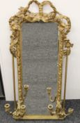 A 19th century gilt girandole mirror. 101 cm high, 54 cm wide.