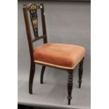 A Victorian inlaid rosewood side chair.
