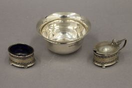 A silver bowl and a silver mustard and salt. The former 11 cm diameter. 2.9 troy ounces.