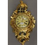 A giltwood Cartel clock. 54 cm high.