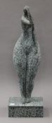 A patinated bronze abstract model of curvaceous girl. 61.5 cm high.