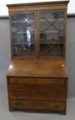 A George III mahogany bureau bookcase.